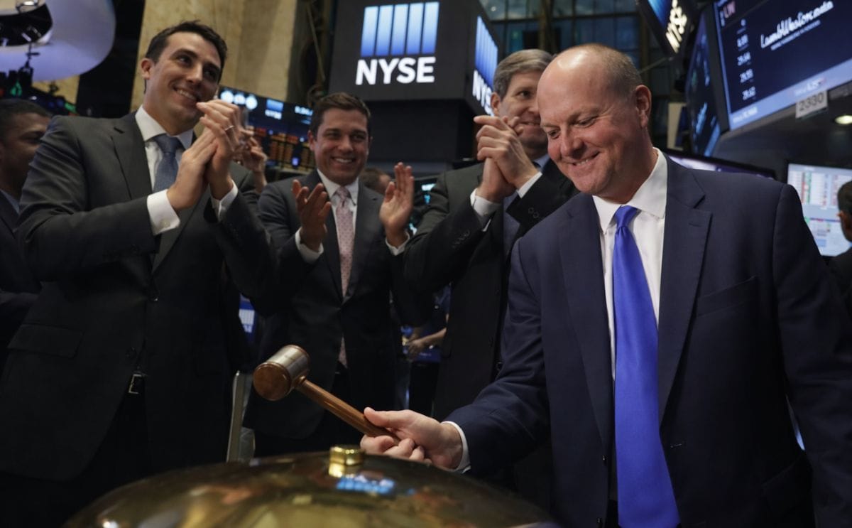 Lamb Weston President and CEO Tom Werner ringsa ceremonial bell after taking part in the company's IPO on the floor of the New York Stock Exchange (NYSE) in New York City, NY, U.S. November 15, 2016 (Courtesy: Reuters / Yahoo Finance)