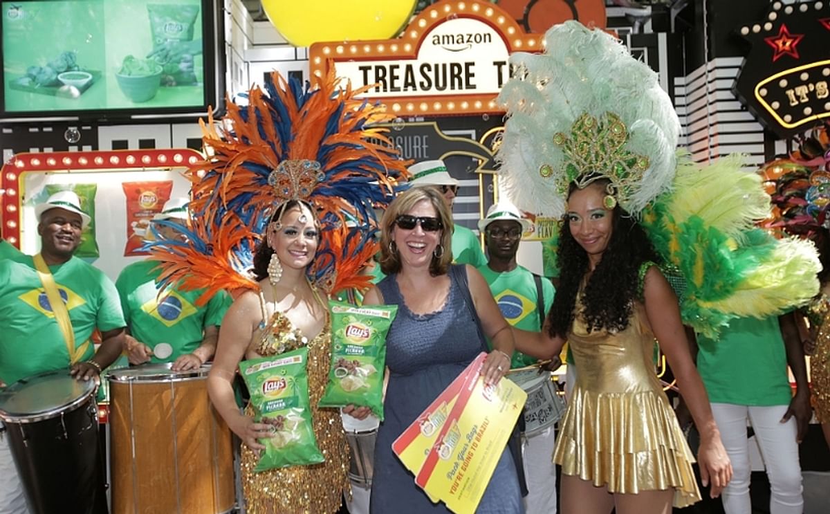 As part of the Lay's 'Passport to Flavor' program, onlookers at the Amazon Treasure Truck in Occidental Square in Seattle, Washington were surprised by Brazilian Carnival to bring the Brazilian Picanha flavor to life