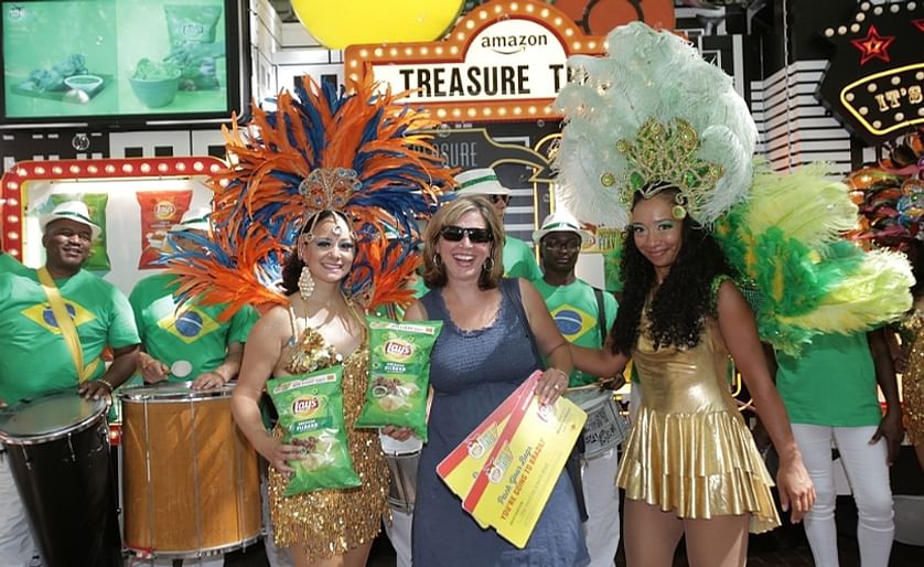 As part of the Lay's 'Passport to Flavor' program, onlookers at the Amazon Treasure Truck in Occidental Square in Seattle, Washington were surprised by Brazilian Carnival to bring the Brazilian Picanha flavor to life