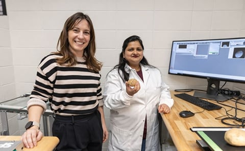 Ashley Wagenaar, ag relations director, PGA, stands with Dr. Diksha Singla, post-doctoral fellow, APHTC Ashley Wagenaar, ag relations director, PGA, stands with Dr. Diksha Singla, post-doctoral fellow, APHTC