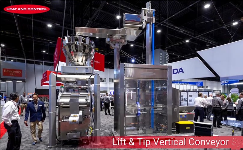 Heat and Control - Lift & Tip Vertical Conveyor System Heat and Control - Lift & Tip Vertical Conveyor System