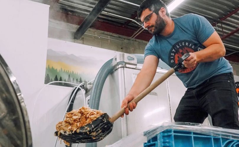 The gin is made from a mix of potato scraps and grain that is transformed into alcohol. Jean-Philippe Roussy, co-founder of Distillerie Mariana, is seen here working with the raw materials. (Courtesy: Loop Mission)