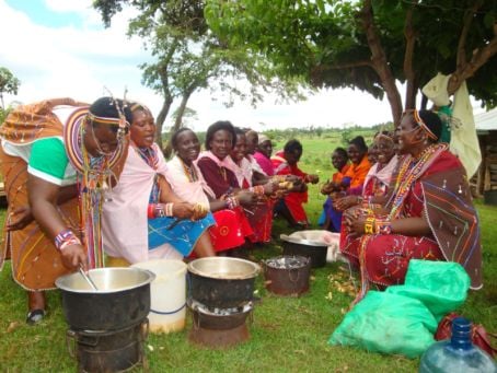 Maasai women trained by Christine Nashuru, peeling potatoes Maasai women trained by Christine Nashuru, peeling potatoes