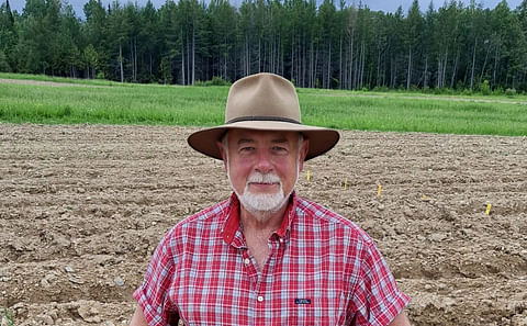 Steven B. Johnson, PhD, UMaine Cooperative Extension professor and crops specialist, poses in a field at the Aroostook Farm in Presque Isle in spring 2021. (Courtesy: Steven Johnson)