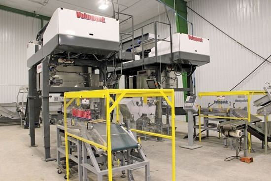 These Volmpack baggers can package potatoes in bags ranging from one pound to 20 pounds. They are one of many new pieces of equipment in the Malin Potato Co-op packing shed being built in Merrill.