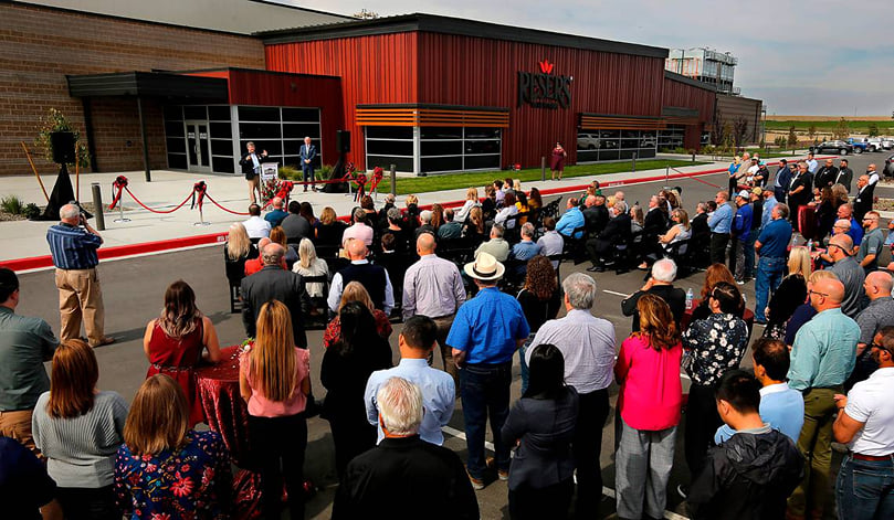 Mark Reser, president of Reser’s Fine Foods, speaks to a crowd during Wednesday’s celebration outside the food company’s newest production facility in Pasco, Wash. The plant will make the company’s signature potato salad and more. (Courtesy: Bob Brawdy) Mark Reser, president of Reser’s Fine Foods, speaks to a crowd during Wednesday’s celebration outside the food company’s newest production facility in Pasco, Wash. The plant will make the company’s signature potato salad and more. (Courtesy: Bob Brawdy)