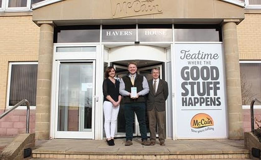 Andra Stan, Matthew Stubbings and Graham Finn (from left to right) posing with the award in front of Havers House at McCain Foods GB Headquarters in Scarborough.