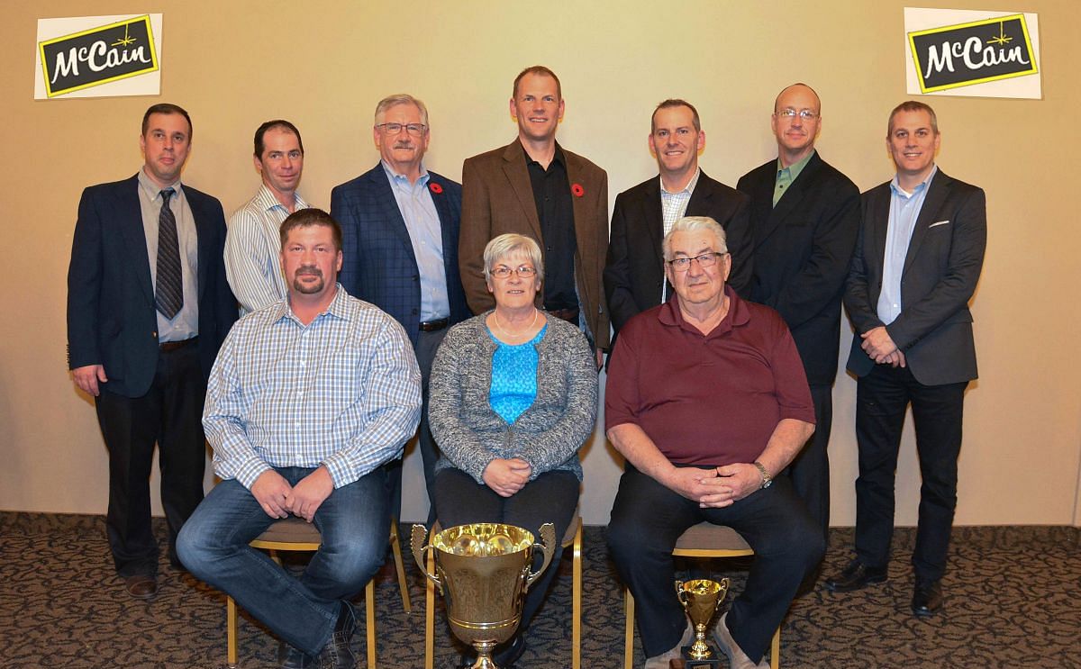 Front (L-R): Derek Fiskel, Karen Fiskel, Rick Fiskel of Fiskel Farms.  Back (L-R): Dave Giroux, Carberry Plant Manager, Bart Witherspoon, Field Department Manager, Dale McCarthy, VP Integrated Supply Chain NA, Bob Hyra, Director, Agriculture NA Mid-West, 