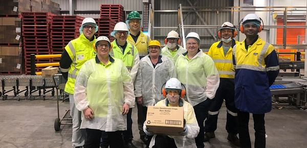 In Tasmania, Australia, McCain Foods has completed the upgrade of its Smithton plant. Staff shows a box of beer battered french fries, that now can be produced on the new batterline and fryer.