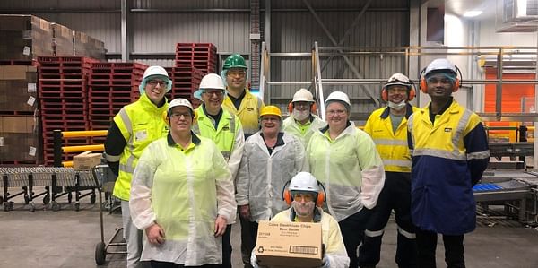 In Tasmania, Australia, McCain Foods has completed the upgrade of its Smithton plant. Staff shows a box of beer battered french fries, that now can be produced on the new batterline and fryer.