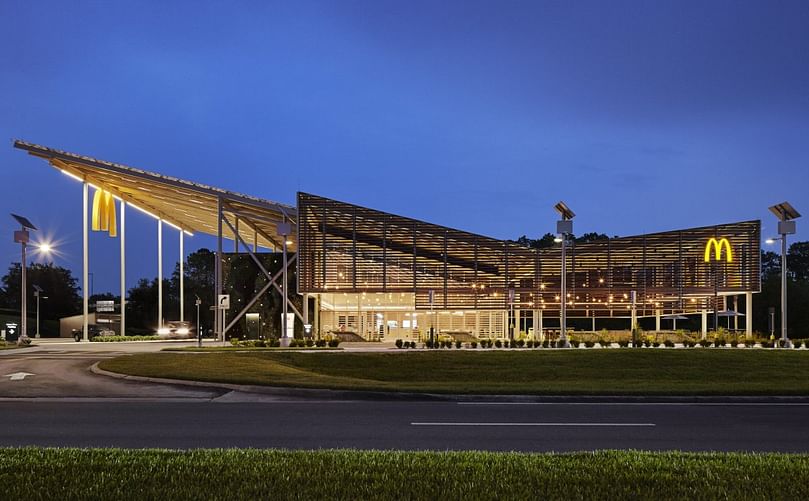 The 8,024 square-foot restaurant features an expansive, v-shaped solar-paneled roof and photovoltaic glass panels integrated throughout the building.