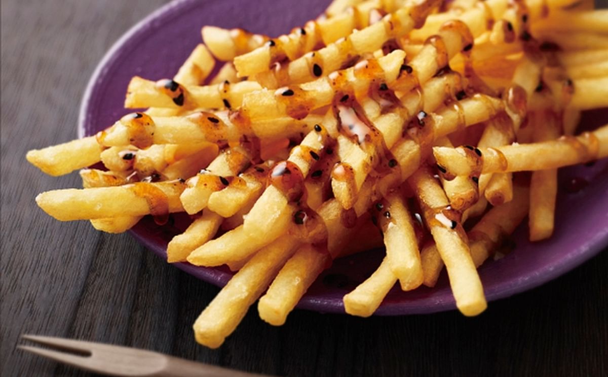 Starting next week, McDonald’s Japan will offer daigaku imo French fries. Daigaku Imo litterally means “college potato”. 
It is a popular sweet potato snack with a sweet sauce, and allegedly gets its unusual name from being a hit with cash-strapped