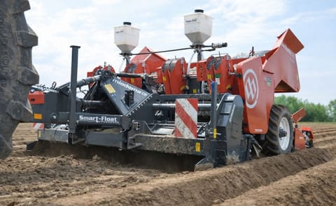 The Miedema CP 42P Smart-Float, a 4-row trailed potato planter, one of several units that will be shown by Dewulf and Miedema at Potato Europe in Doornik, Belgium. The Miedema CP 42P Smart-Float, a 4-row trailed potato planter, one of several units that will be shown by Dewulf and Miedema at Potato Europe in Doornik, Belgium.