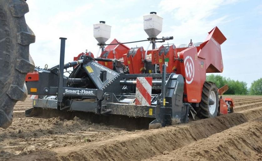 The Miedema CP 42P Smart-Float, a 4-row trailed potato planter, one of several units that will be shown by Dewulf and Miedema at Potato Europe in Doornik, Belgium.
