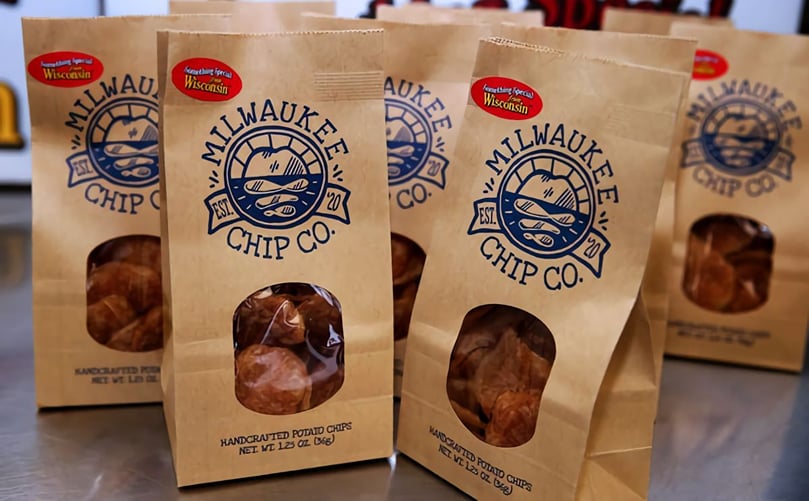 The logo on Milwaukee Chip Co. bags was inspired by the founder seeing the People's Flag of Milwaukee and its lake sunrise design on walks around his Riverwest neighborhood. (Courtesy: Angela Peterson / Milwaukee Journal Sentinel) The logo on Milwaukee Chip Co. bags was inspired by the founder seeing the People's Flag of Milwaukee and its lake sunrise design on walks around his Riverwest neighborhood. (Courtesy: Angela Peterson / Milwaukee Journal Sentinel)