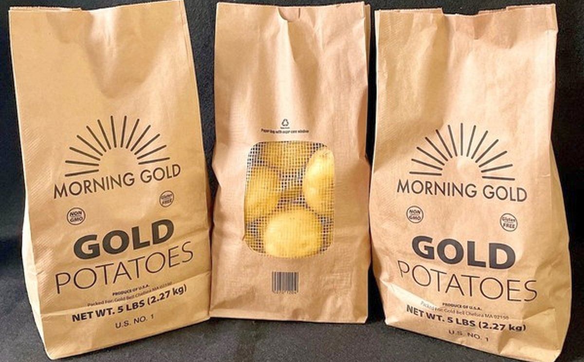 The new potato packaging bags are made of two-ply paper with compostable glue used around the window of the bag.