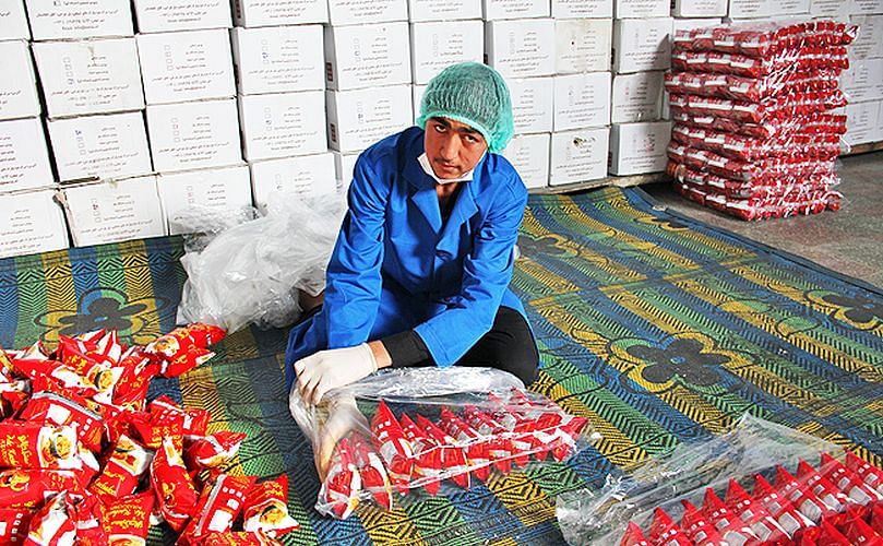 Preparing the Mr Kachaloo potato chips for distribution to now about 10.000 of the 100.000 corner shops in the Afghan capital Kabul