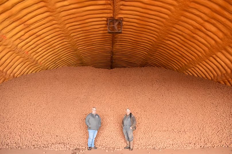 Steve Watts of Genesis Crop Systems Inc, left, and farmer Vernon Campbell take a moment to discuss their collaboration on a nitrogen fertilizer trial with Living Labs Atlantic at Campbell's farm March 27. (Courtesy: SaltWire Network)