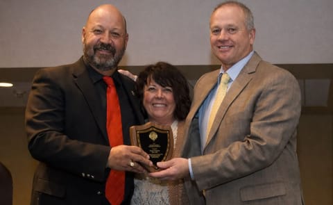 Boyd Foster (right) and his wife Laurie of Vista Valley Ag in Ririe, Idaho, receive the prestigious 2016 Environmental Stewardship Award from Jim Tiede (left) Boyd Foster (right) and his wife Laurie of Vista Valley Ag in Ririe, Idaho, receive the prestigious 2016 Environmental Stewardship Award from Jim Tiede (left)