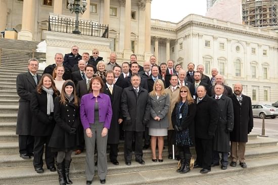 Potato D.C. Fly-In participants pose for a group photo before visiting members of Congress on Capitol Hill