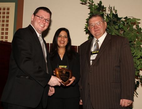 Suniti Moudgil (center) from DuPont presents Jeremie (left) and Dick Pavelski (right) of Heartland Farms with the National Potato Council’s (NPC) 2011 Environmental Stewardship Award at NPC’s 2012 Annual Meeting, held January 6-7, 2012, in Orlando, Fla