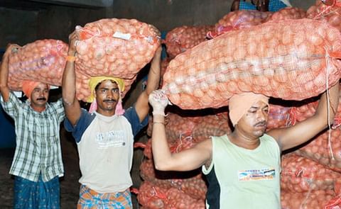 Workers carry potatoes inside a cold storage at Aiginia in Bhubaneswar, Odisha (Courtesy: Telegraph India / Ashwinee Pati) Workers carry potatoes inside a cold storage at Aiginia in Bhubaneswar, Odisha (Courtesy: Telegraph India / Ashwinee Pati)