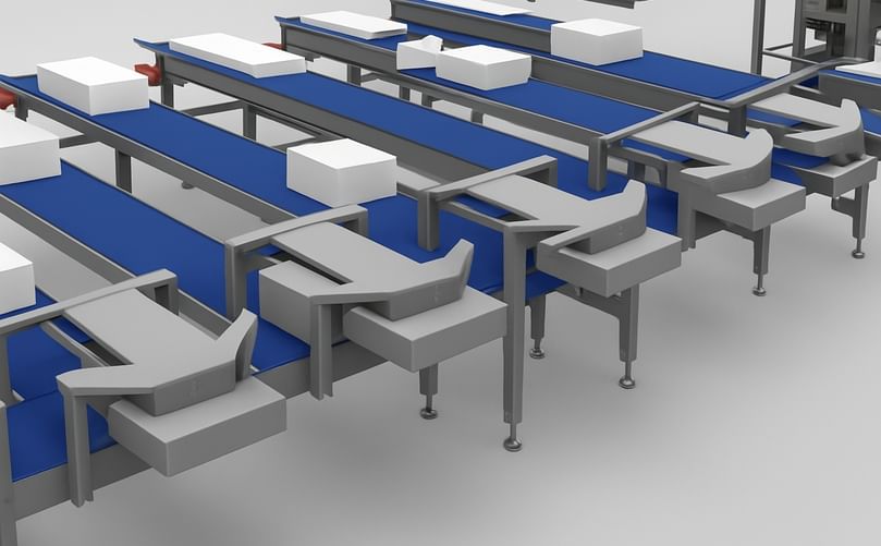 Automated carton sortation conveyors used in the Orangefreezing CBF/VRT/SRT freezing line, showing diverters and blue conveyor lanes for directing product flow Automated carton sortation conveyors used in the Orangefreezing CBF/VRT/SRT freezing line, showing diverters and blue conveyor lanes for directing product flow