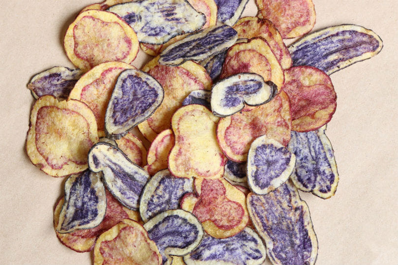 Papas de colores llaman la atención de empresas y productores