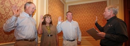 Pat Kole, Vice President of Legal Affairs for the Idaho Potato Commission, swears in new Commissioners Toevs, Grover and Brown at the IPC's October meeting in Sun Valley, Idaho Pat Kole, Vice President of Legal Affairs for the Idaho Potato Commission, swears in new Commissioners Toevs, Grover and Brown at the IPC's October meeting in Sun Valley, Idaho