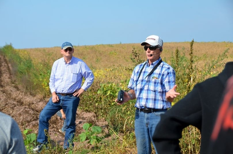 Keith Masser (right), chairman and CEO of Sterman Masser Potato Farms, talks to Penn State agribusiness management students as Rick Roush, dean of the College of Agricultural Sciences, looks on. Keith Masser (right), chairman and CEO of Sterman Masser Potato Farms, talks to Penn State agribusiness management students as Rick Roush, dean of the College of Agricultural Sciences, looks on.