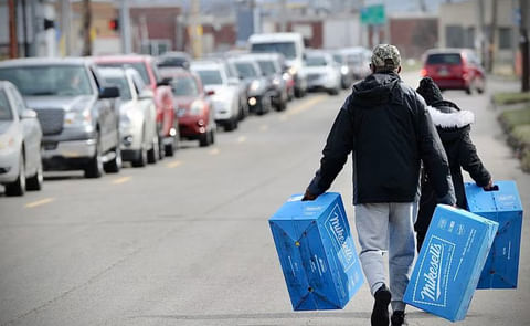 People are waiting in line for over an hour to get their last chance to buy Mikesell’s chips People are waiting in line for over an hour to get their last chance to buy Mikesell’s chips