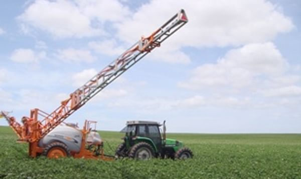  Spraying pesticides in potato field