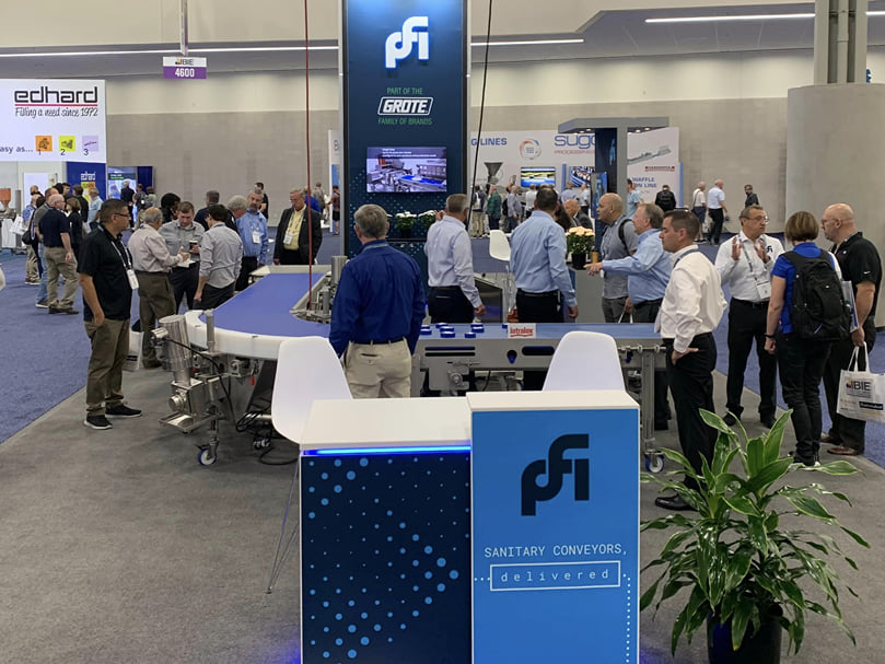 PFI showcased its new branding and a running conveyor line at the IBIE 2022 Baking Expo in Las Vegas, Sept. 18-21, in booth 4016, shared with Grote Company. PFI showcased its new branding and a running conveyor line at the IBIE 2022 Baking Expo in Las Vegas, Sept. 18-21, in booth 4016, shared with Grote Company.