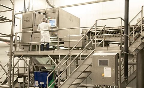 Jeremie Pavelski, President at Heartland Farms, Top Tier Ingredients, checks the potato flake optical sorter Jeremie Pavelski, President at Heartland Farms, Top Tier Ingredients, checks the potato flake optical sorter