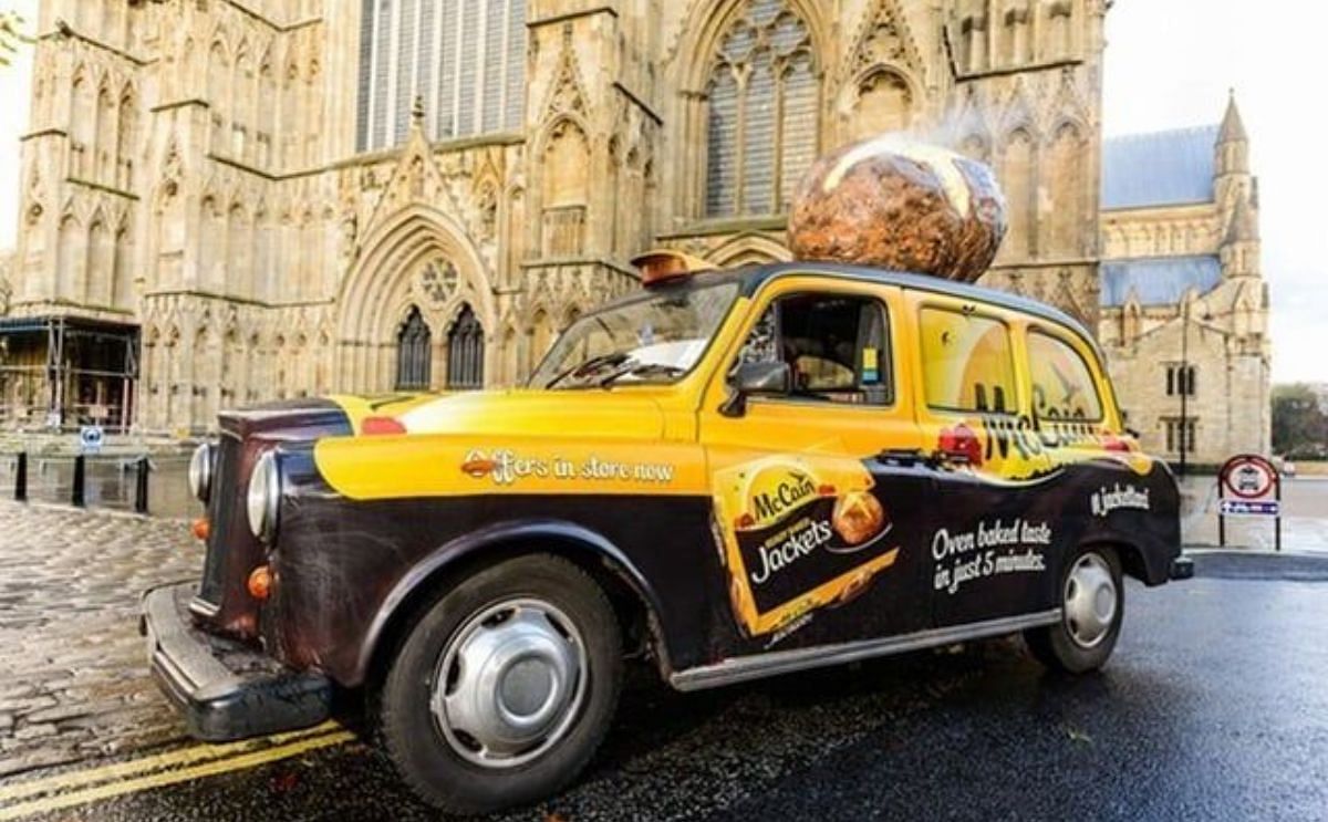 McCain Potato scented taxi in front of london eye McCain Potato scented taxi in front of london eye