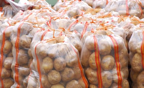 Potatoes in plastic bags Potatoes in plastic bags