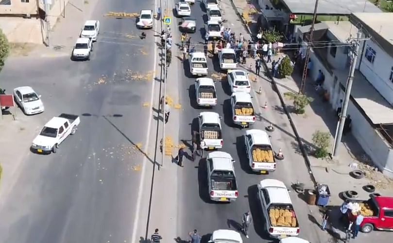 Potato farmers protest in front of the agriculture ministry in Erbil on September 24, 2020.