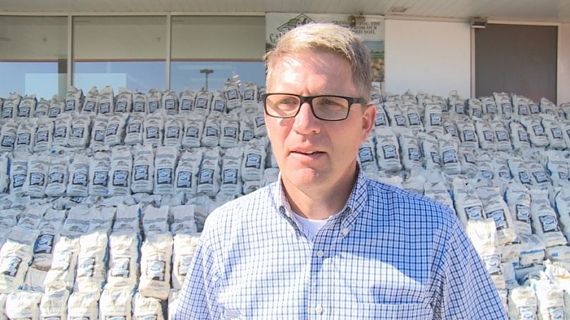 Greg Donald, general manager of the Prince Edward Island Potato Board in front of the record setting potato display.