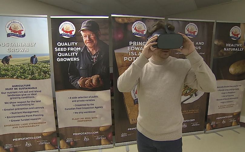 Potato Board staff, including Mark Phillips, have also been checking out the virtual reality goggles. (Courtesy CBC) Potato Board staff, including Mark Phillips, have also been checking out the virtual reality goggles.