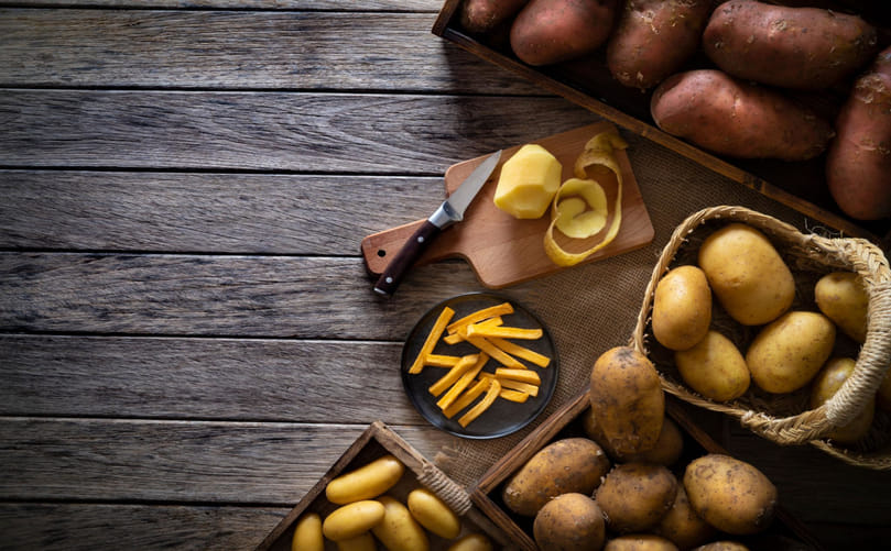 Farm-to-Fryer Journey: Raw Potatoes Transformed into Crispy French Fries Farm-to-Fryer Journey: Raw Potatoes Transformed into Crispy French Fries
