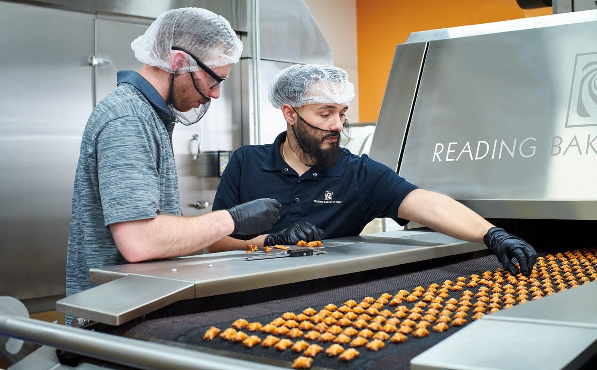 RBS specialists demonstrate hands-on pretzel processing techniques in preparation for the Pretzel Training Seminar on February 3–4, 2026.