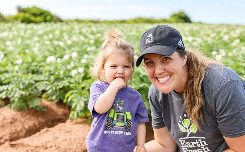 Rose Topic in a potato field with her daughter, Mae. (Courtesy by Keisha Rose Topic)