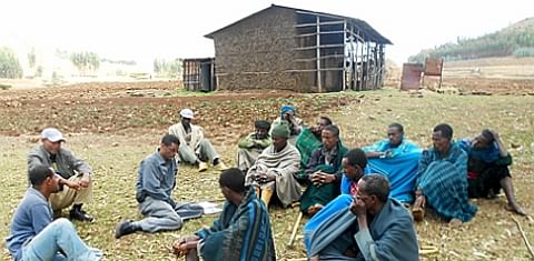  Semagn-Asredie Kolech with Ethiopian farmers