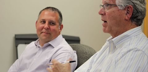 Newly hired Fort Fairfield Town Manager Tim Goff (left) listens as Dan Foster, outgoing interim town manager, address the council Wednesday, Sept. 20. (Courtesy: The Star-Herald)