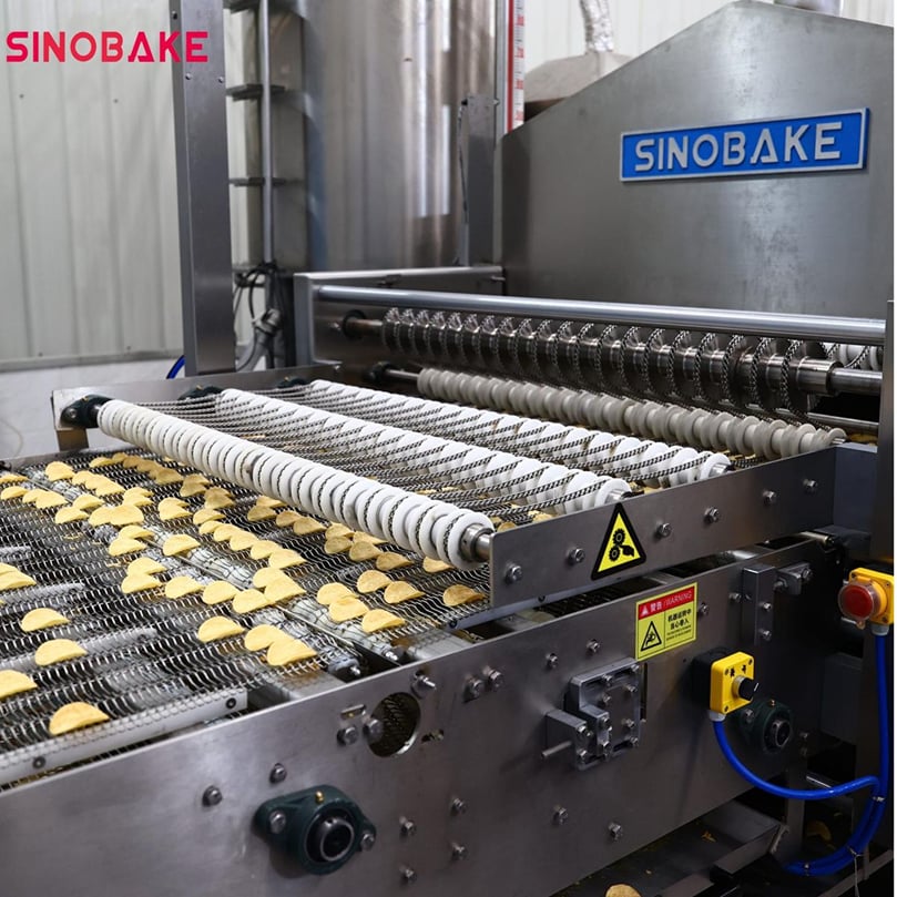 Shaped to Perfection: Semi-finished chips move seamlessly through the system after molding, ready for the next processing stage. Shaped to Perfection: Semi-finished chips move seamlessly through the system after molding, ready for the next processing stage.