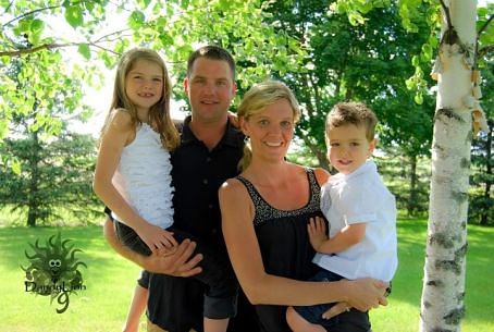 Young Farmer of the Year Shawn Doyen with his wife Christi and their two children, Taylor, 7 and Charles, 3