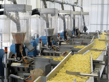 Shearer Foods potato chip distribution. Vibrating pans pivot left or right according to demand signals from each scale.  