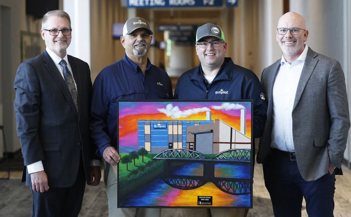 Simplot Inc. representatives David Valdez, second from left, and Andrew Hexum, second from right, accept the 2026 Klaus Thiessen Impact Award from EDC President and CEO Keith Lund, left, and EDC Board of Directors Chairman Shawn Gaddie, right, at the Thu Simplot Inc. representatives David Valdez, second from left, and Andrew Hexum, second from right, accept the 2026 Klaus Thiessen Impact Award from EDC President and CEO Keith Lund, left, and EDC Board of Directors Chairman Shawn Gaddie, right, at the Thu