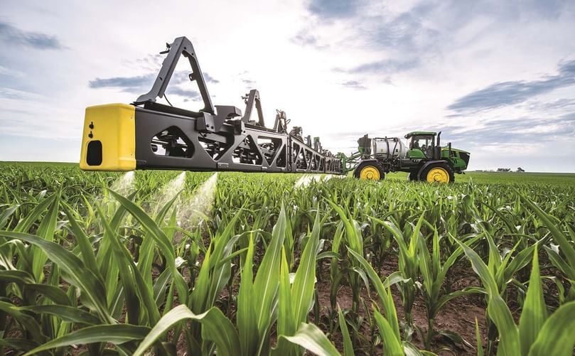 John Deere’s See & Spray precision technology, shown operating, enables targeted application using its self-propelled dual-tank system. It can also be retrofitted to existing sprayers or used in green-on-brown mode for efficient fallow field management.