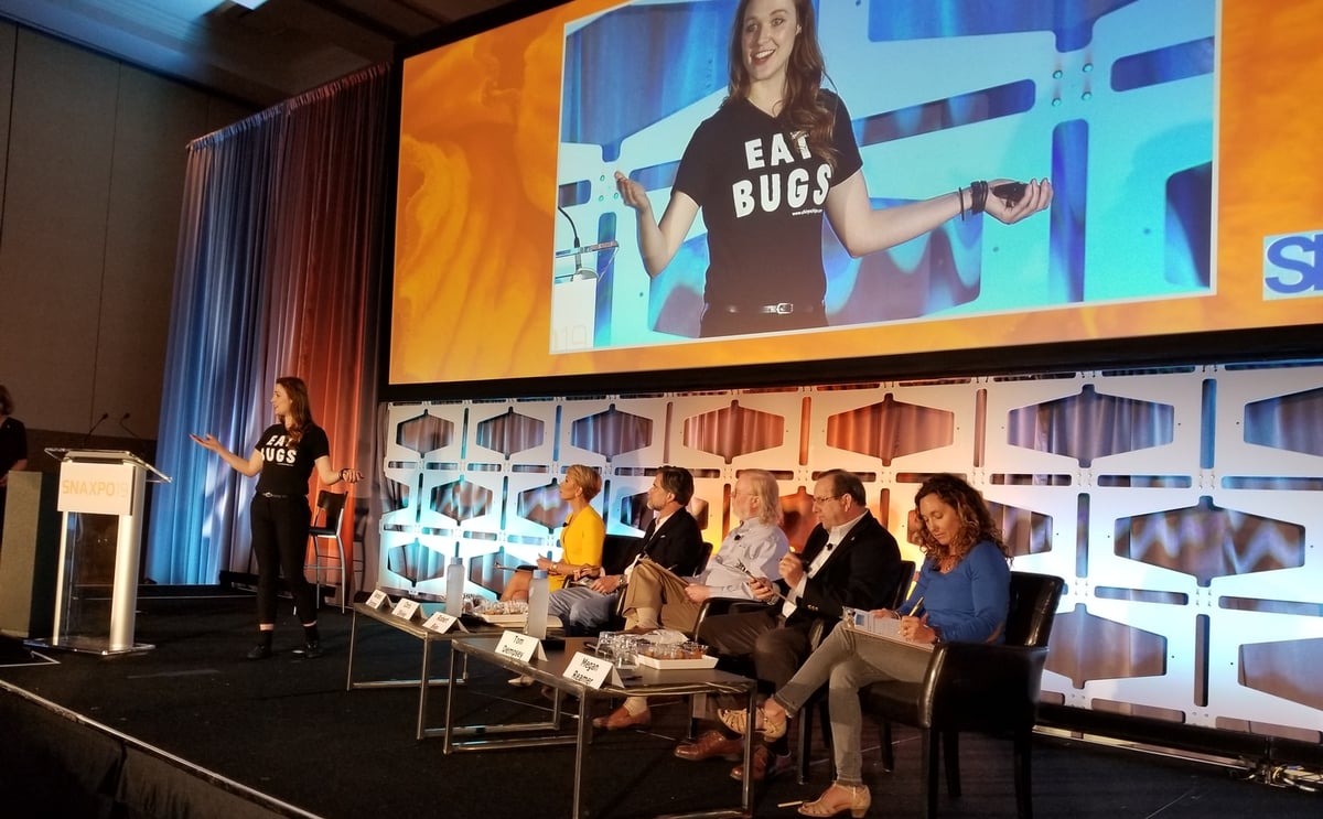 The SNAC Tank pitch competition at SNAXPO 2018 with 'Shark' Barbara Corcoran and Laura D'Asaro, co-founder of Chirps Chips during her winning presentation. The SNAC Tank pitch competition at SNAXPO 2018 with 'Shark' Barbara Corcoran and Laura D'Asaro, co-founder of Chirps Chips during her winning presentation.